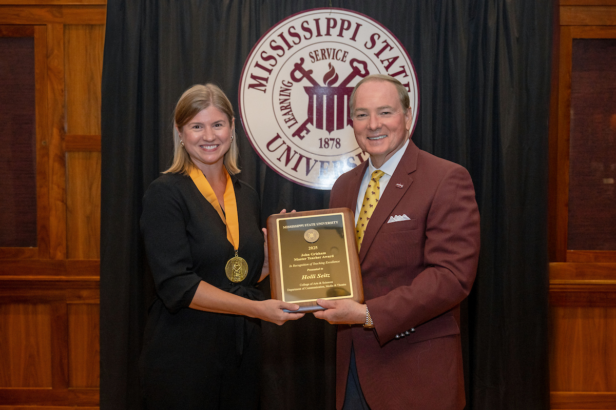 Holli Seitz Receiving Grisham Master Teacher Award