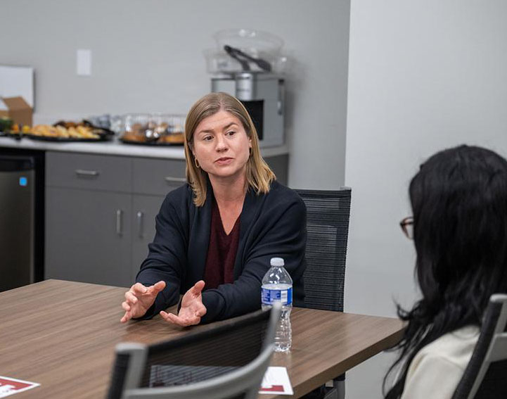 Holli Seitz speaks with a potential communication graduate student