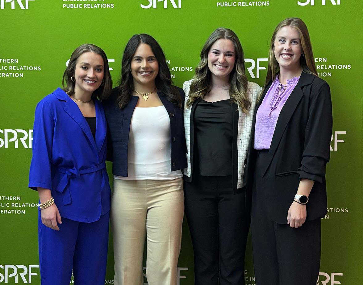 Photo of PR competition winners, left to right, Caroline Flint, Parker Acosta, Alice Ann Haab, and Maggie Heath