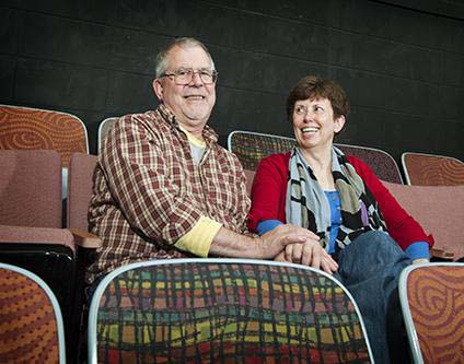 Photo of Wayne and Jo Durst sitting in the chairs in the MSU McComas Hall Theater