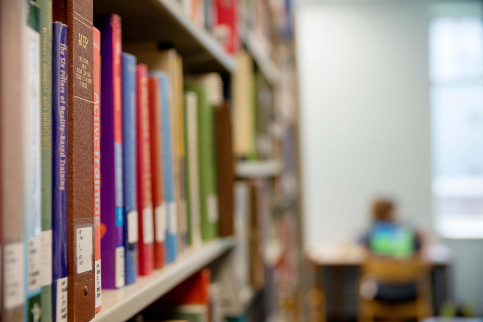 Books on shelf in library