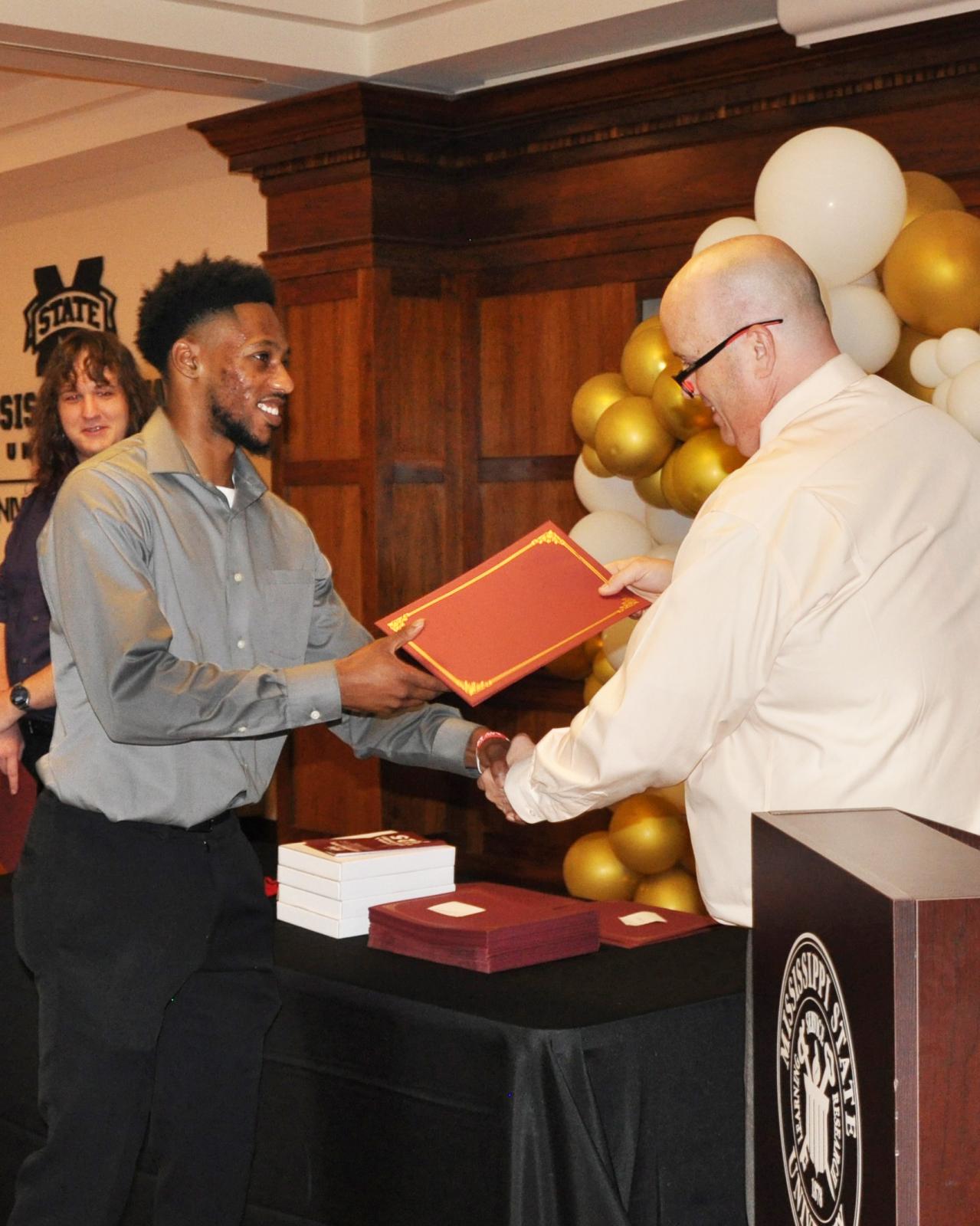 Kevin Williams Giving Student Award